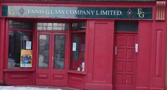 Ennis Glass Company Limited sign above a glass shopfront