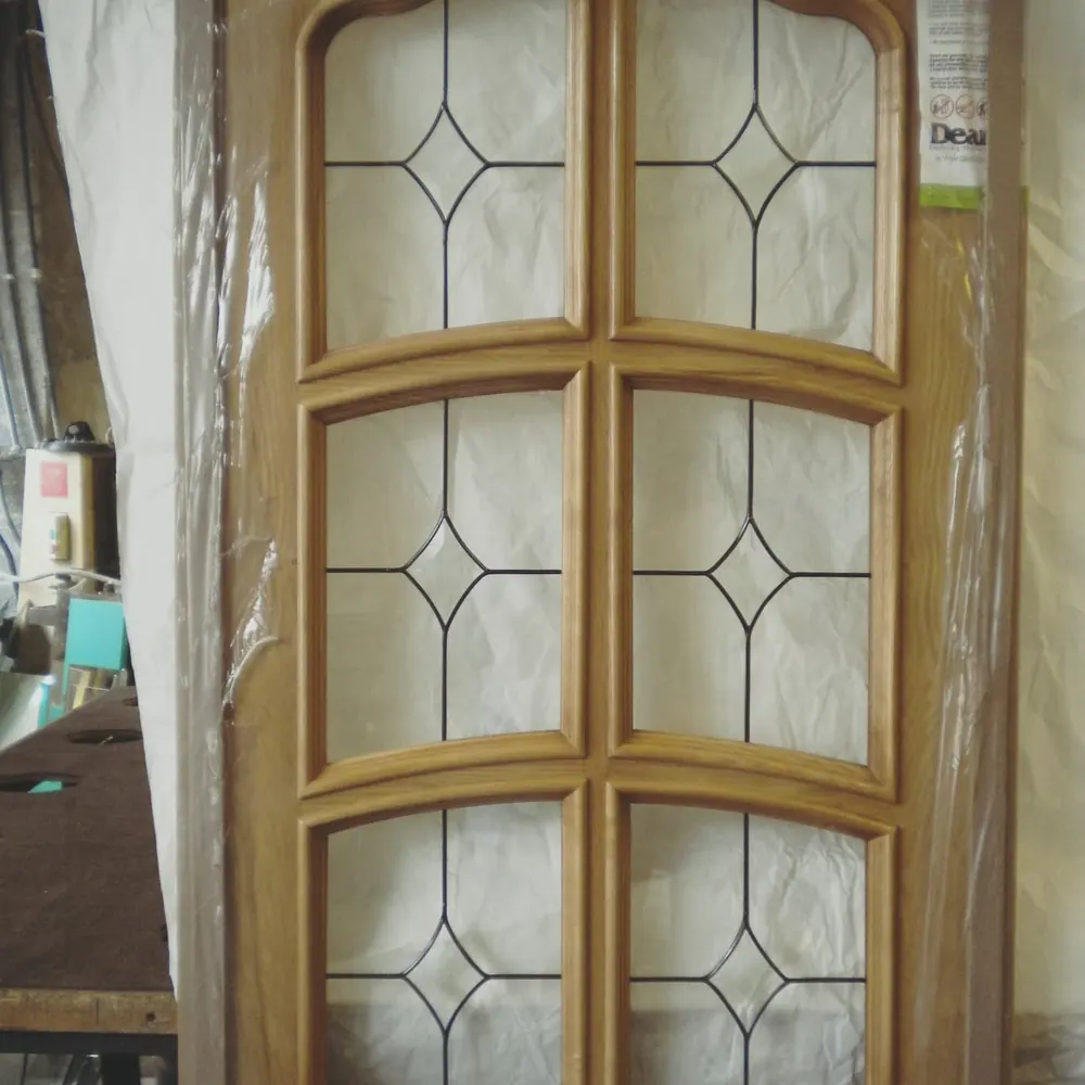 Timber door with six leaded diamond glass panes ready to fit